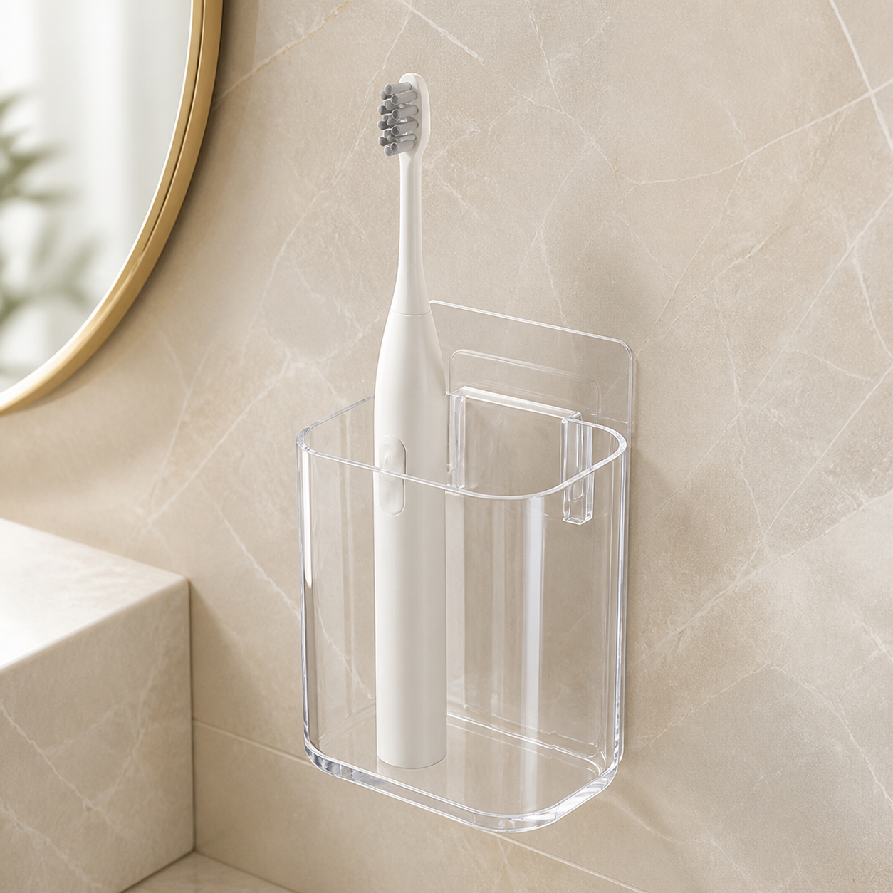 Clear adhesive wall-mounted toothbrush cup holding one white electric toothbrush