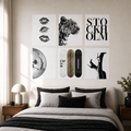 Six unframed abstract canvas print sheets arranged above a warm neutral bed