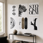 Six unframed abstract canvas print sheets displayed above a living room console