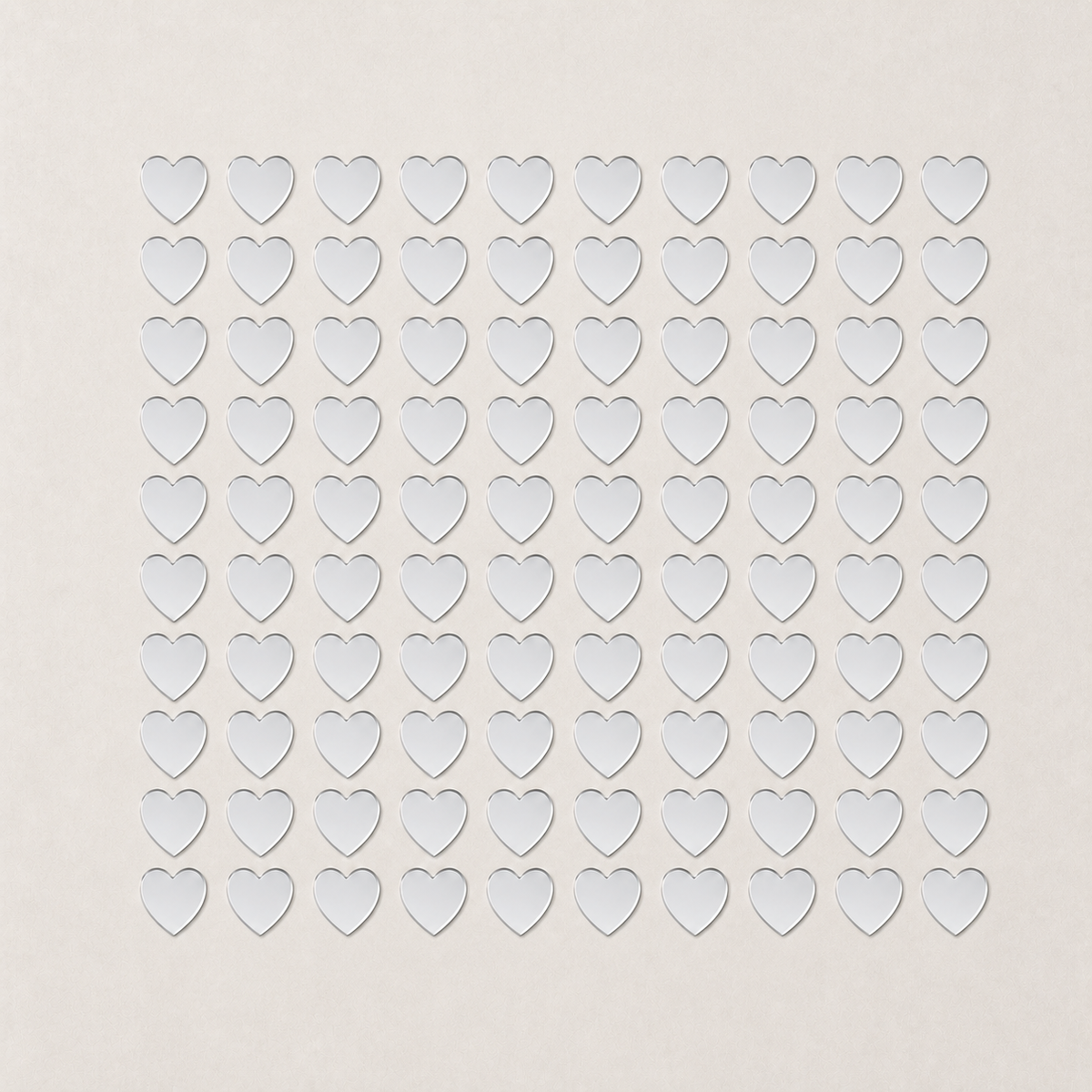 Complete 100-piece silver heart mirror sticker set arranged in ten rows of ten