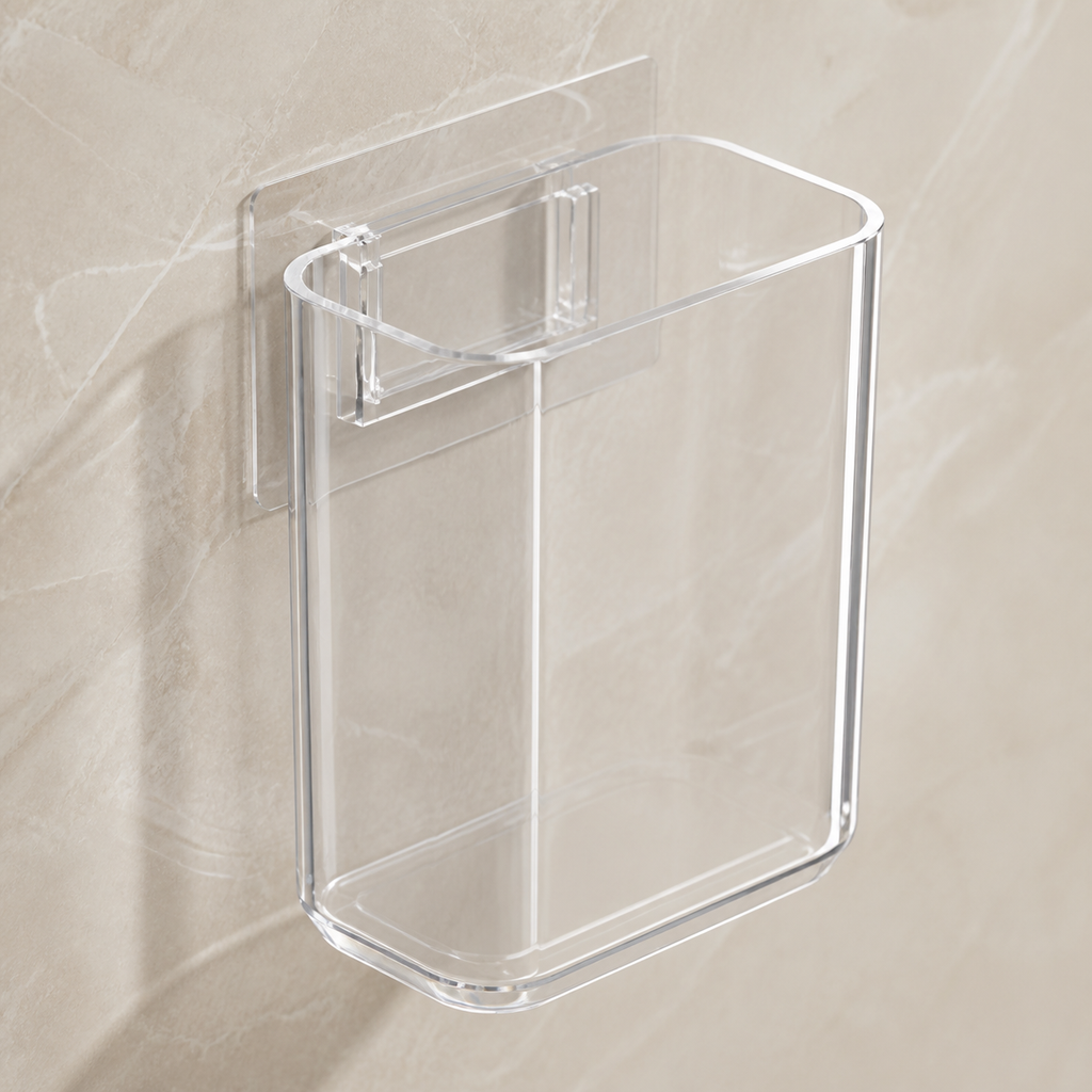 Close view of the clear open-top toothbrush cup and transparent adhesive mounting plate