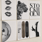 Close view of six thin unframed canvas print sheets and their woven texture