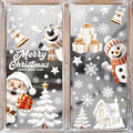 Cozy Haven Christmas Window Sticker Set on a bright window