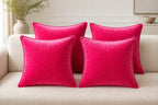 Cozy Haven velvet-feel pillow cover in Rose Red styled on sofa or bed