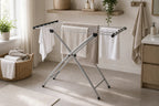 Cozy Haven White Accordion Foldable Drying Rack close view with towels in a bathroom laundry space
