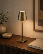 Bronze LED classic table lamp on a console or sideboard