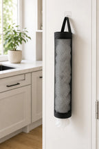 Cozy Haven black wall-mounted grocery bag holder styled near kitchen storage