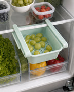 Green vented under-shelf fridge drawer with grapes