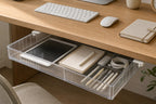 Clear large adhesive under-desk drawer organizer below a wood desk