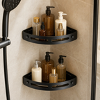 Shower caddy 2-pack in matte black — curved corner shelves mounted in a shower