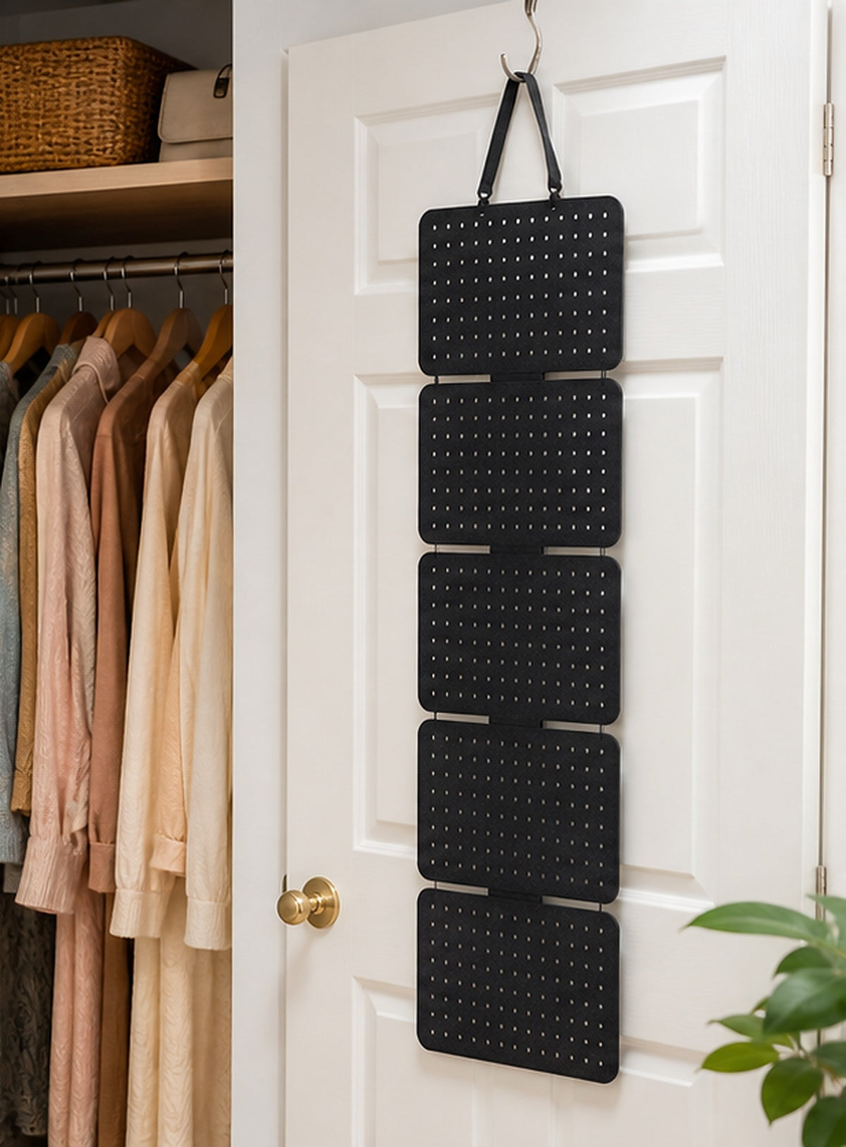 Cozy Haven Black Hanging Earring Organizer styled in a home setting