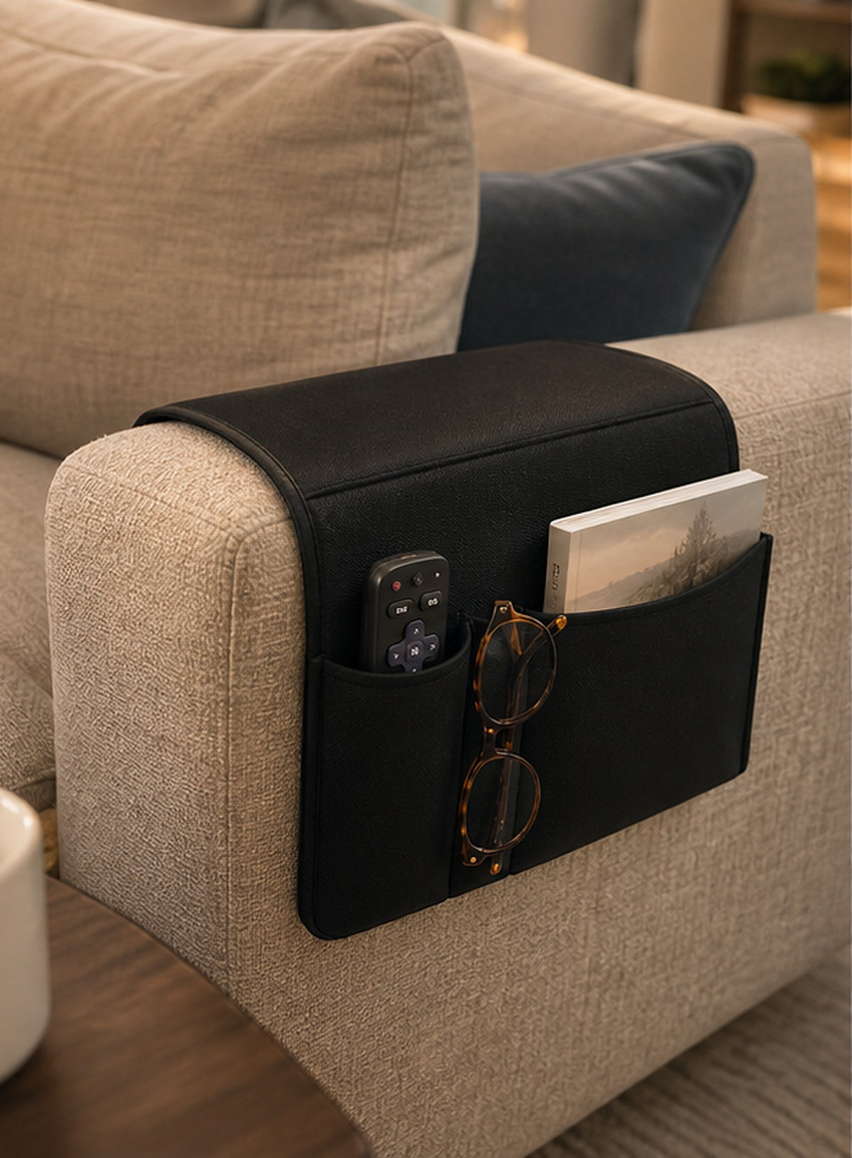 Cozy Haven Black Sofa Armrest Organizer styled in a home setting