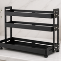 Cozy Haven black 3-tier countertop spice rack on a kitchen counter