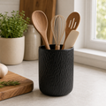 Cozy Haven black small ceramic utensil holder on a kitchen counter