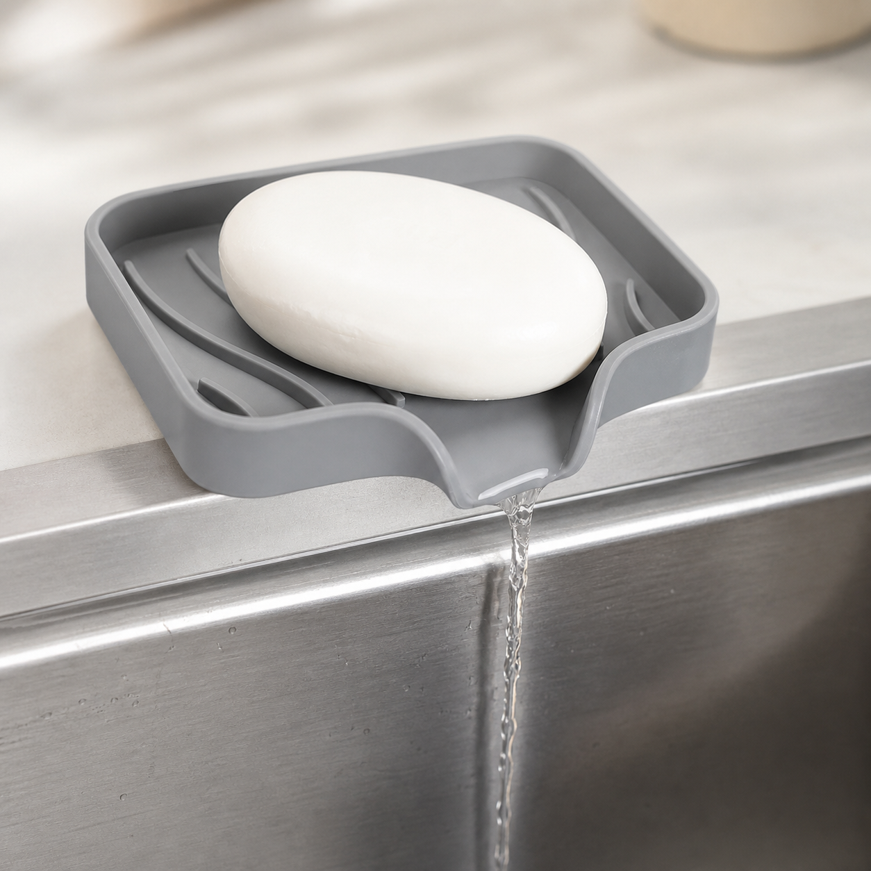 Self-Draining Sink Caddy - gray drain spout in use