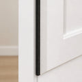 Cozy Haven Black EVA Seal Strip installed on a white door