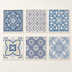 Six blue retro-pattern Swedish dishcloths arranged in a countable two-by-three flat lay