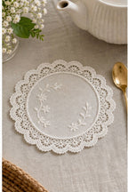 Cozy Haven vintage white lace coaster mat on linen table setting
