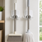 Cozy Haven White Adhesive Broom Mop Clip Holder 2-piece set holding a broom and mop
