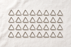 Cozy Haven Stainless Steel Tablecloth Clips shown in a 32 piece table setting pack