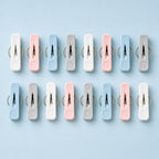 Cozy Haven Mixed Color Laundry Clips - mixed color laundry clips 16-piece set blue background flat lay