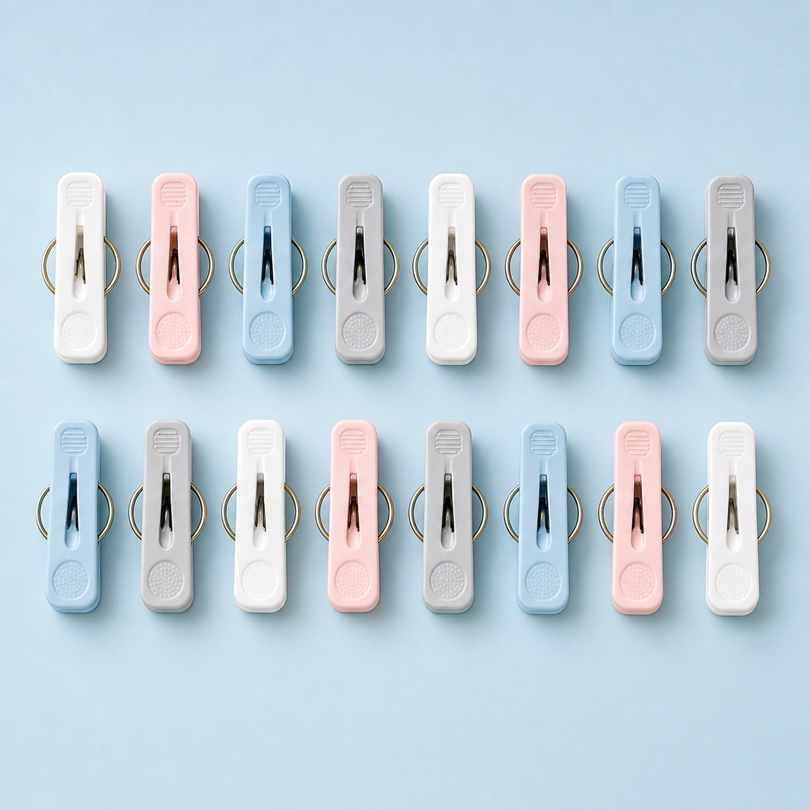 Cozy Haven Mixed Color Laundry Clips - mixed color laundry clips 16-piece set blue background flat lay