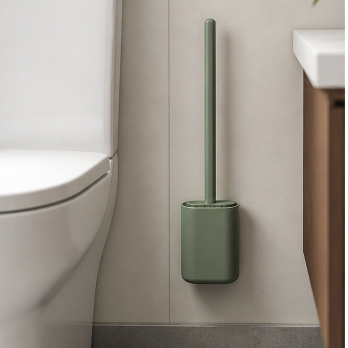 Cozy Haven Green Wall-Mounted Silicone Toilet Brush Set styled in a home setting
