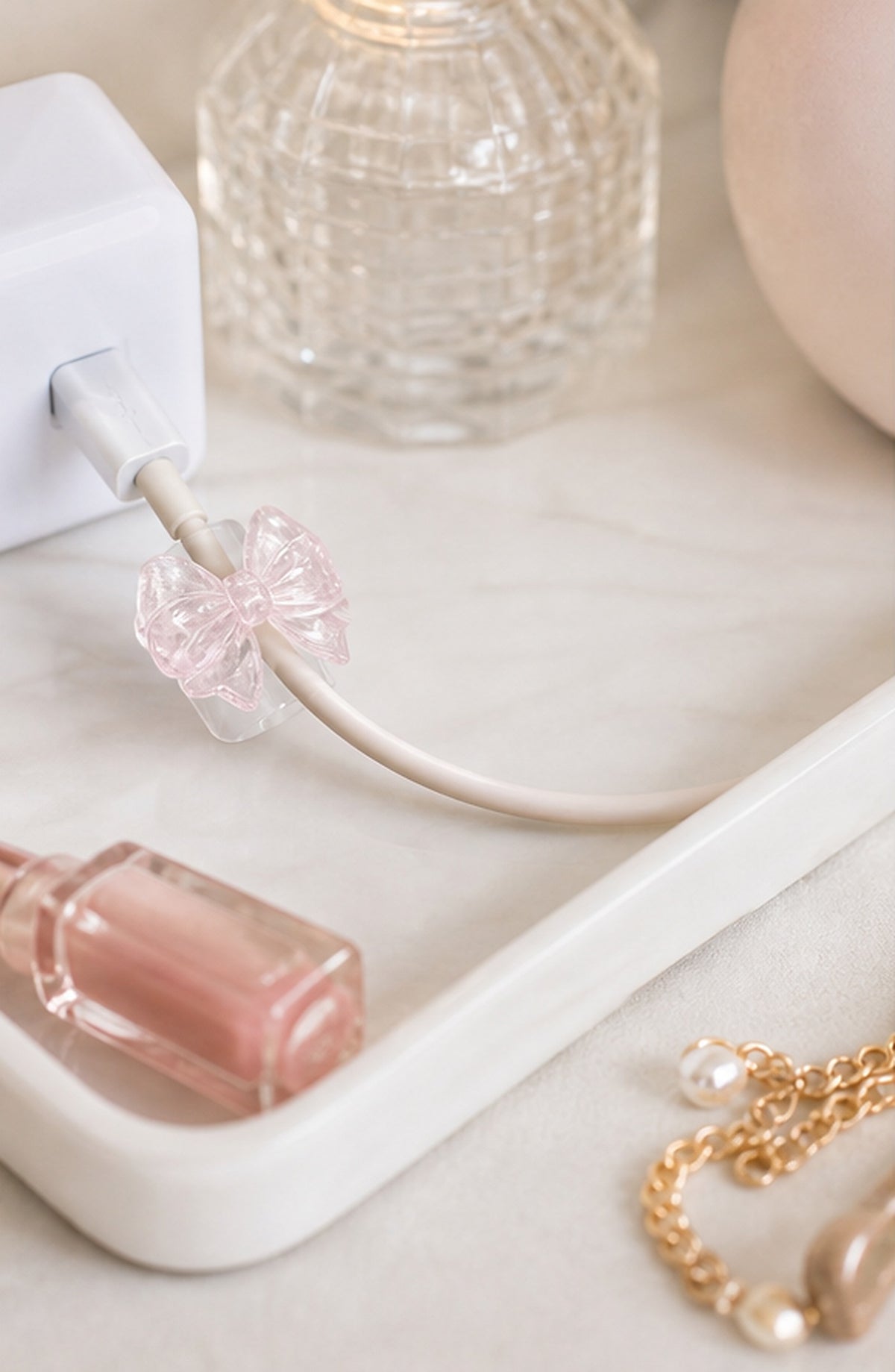 Cozy Haven Pink Bow Cable Protector Clips - 2 Piece Set styled in a home setting