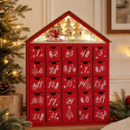 Red wooden house-shaped advent calendar with 24 drawers on a holiday mantel