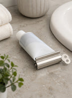 Cozy Haven Silver Toothpaste Tube Squeezer styled bathroom view 1