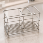 Cozy Haven Stainless Toothbrush Stand detail showing one wide compartment, two narrow compartments, wire grid, and feet