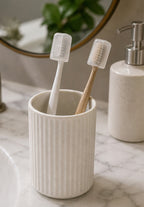 Cozy Haven Translucent Toothbrush Cover Caps styled bathroom view 1