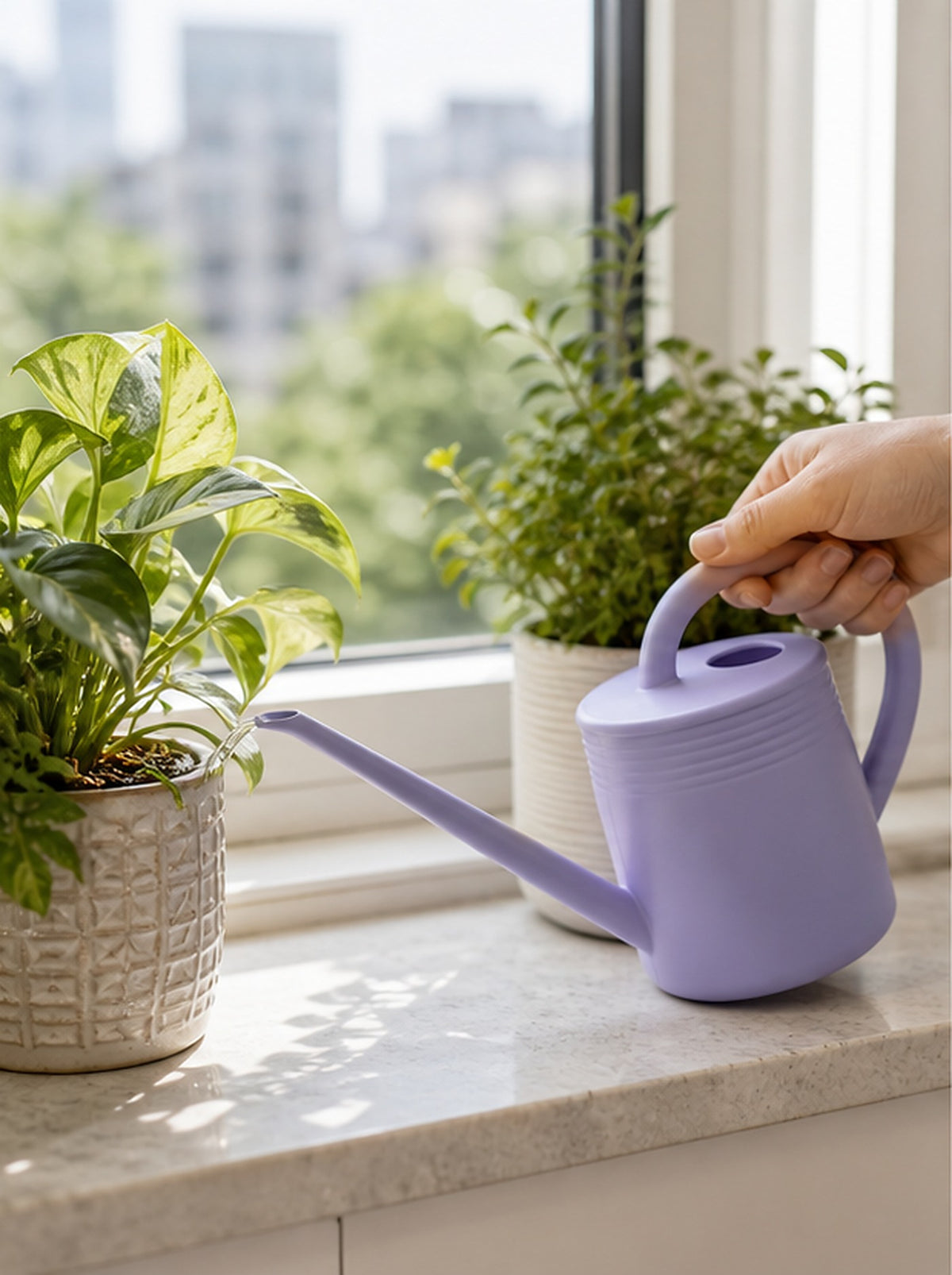 Cozy Haven Violet Indoor Watering Can styled in a home setting