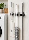 Cozy Haven Wall-Mounted Broom Holder Set lifestyle image 1