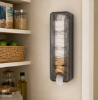 Cozy Haven smoky black bag dispenser mounted beside pantry shelves