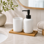 Cozy Haven White Ceramic Soap Dispenser Tray Set styled on a vanity
